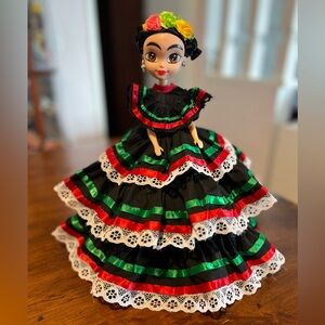 Mexican Doll with a black dress and the colors of Mexico.